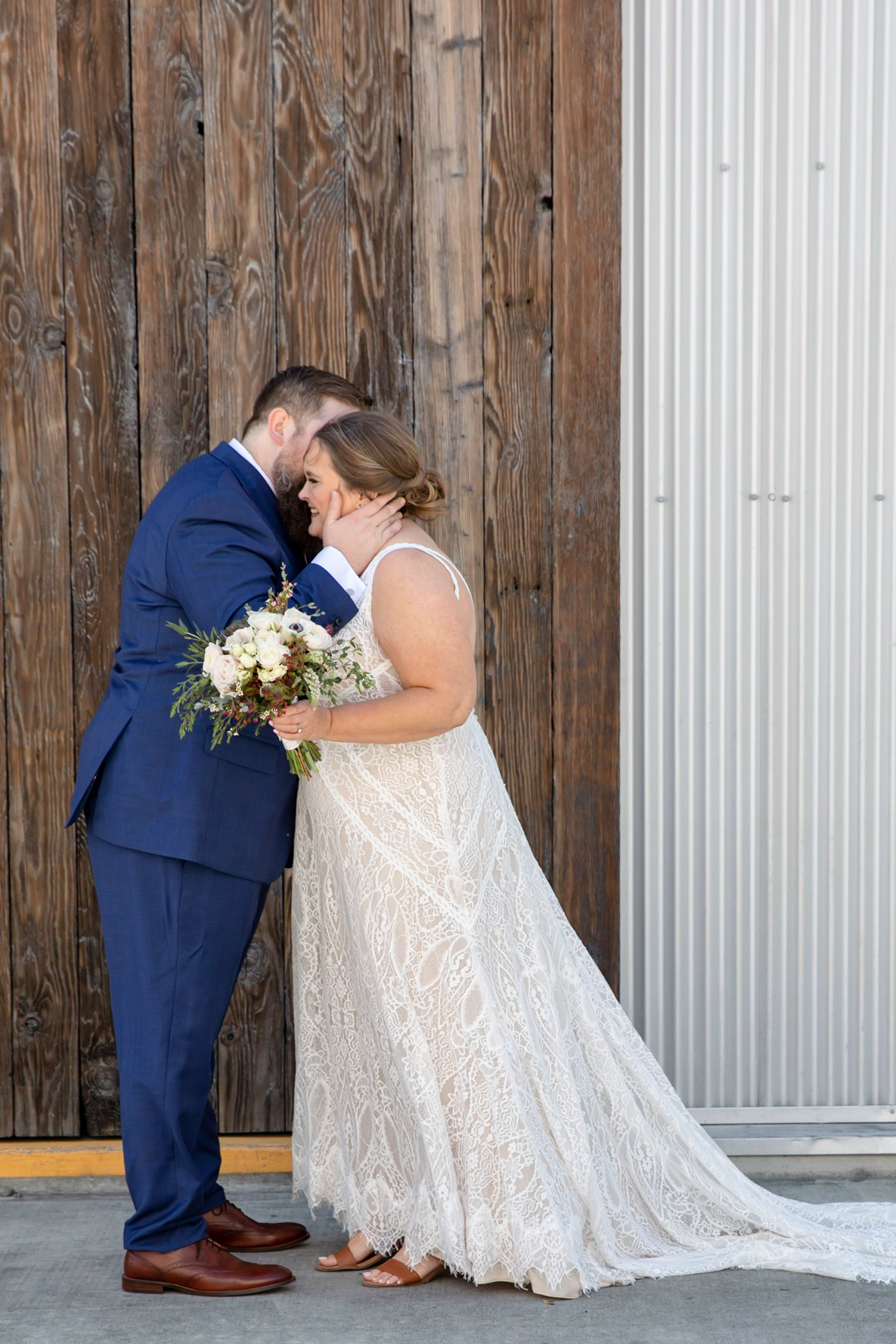 Groom Whispers in Bride's Ear Wedding at Blue Ridge Kitchen in Sebastopol California