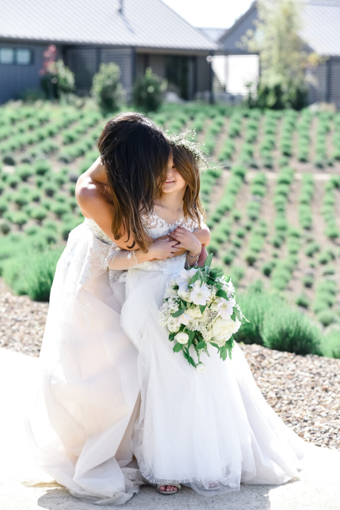 Bride and flower girl at Stanly Ranch wedding venue in Napa Valley. 