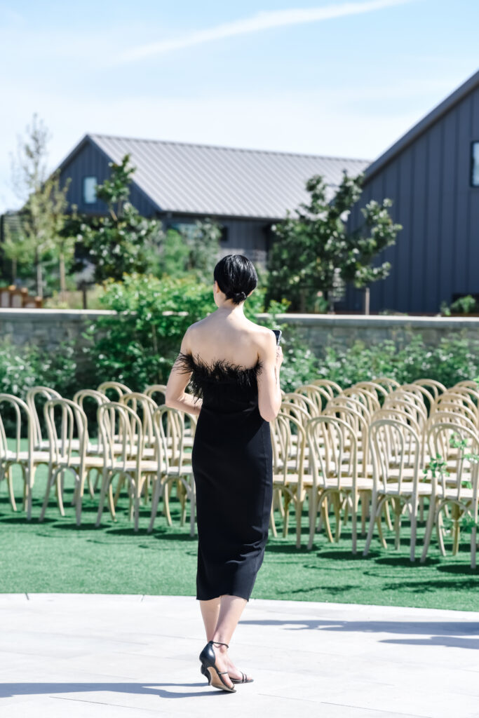Black wedding guest dress at Stanly Ranch wedding venue in Napa Valley. 