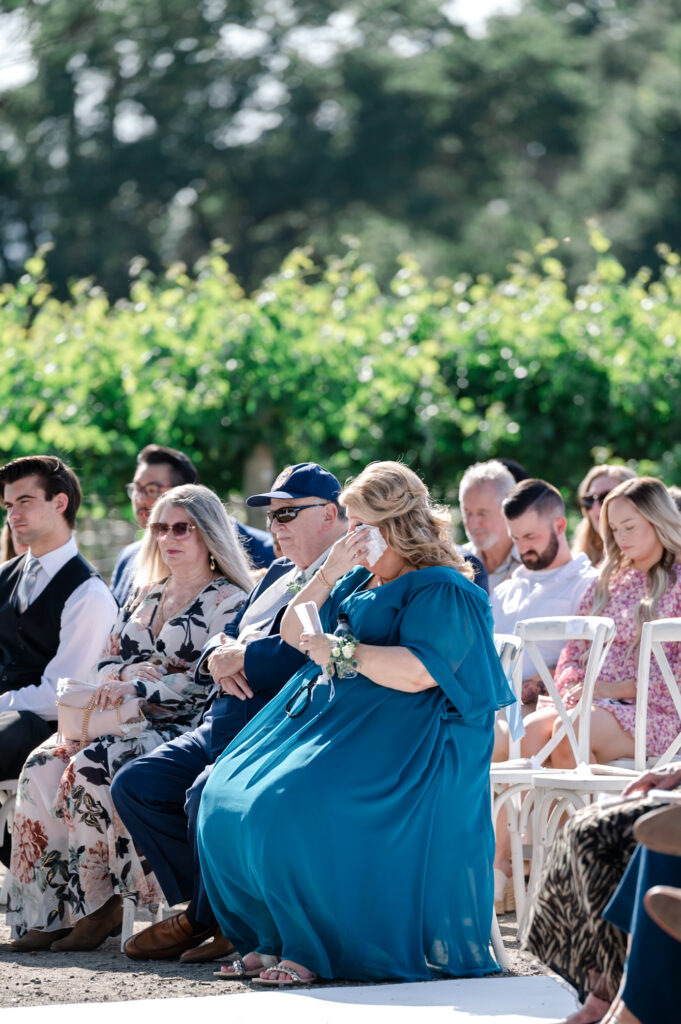 Emotional wedding guests at deLorimier Winery Wedding Venue in Sonoma County.