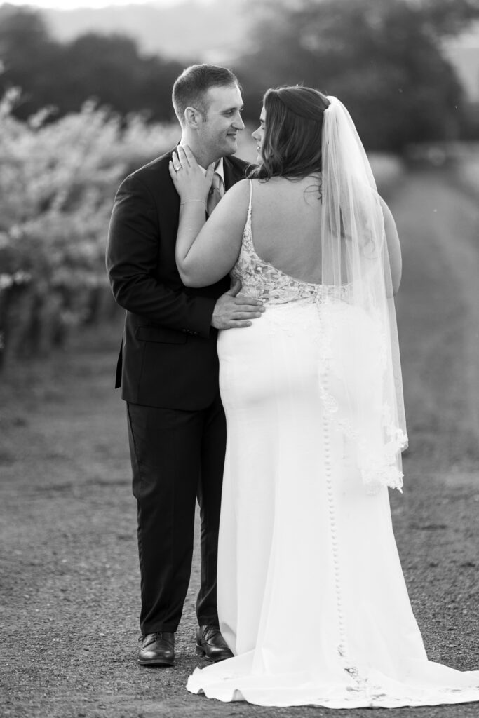 Black and white portrait of bride and groom at deLorimier Winery Wedding Venue in Sonoma County.