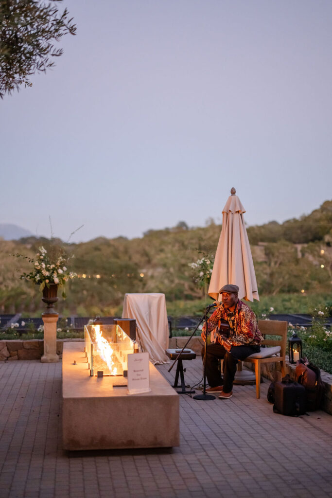Musician performing live during an outdoor wedding reception at Montage Healdsburg in Sonoma County