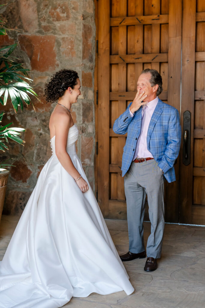 Bride sharing an emotional first look moment with her father at Mayacama Golf Club wedding in Sonoma.